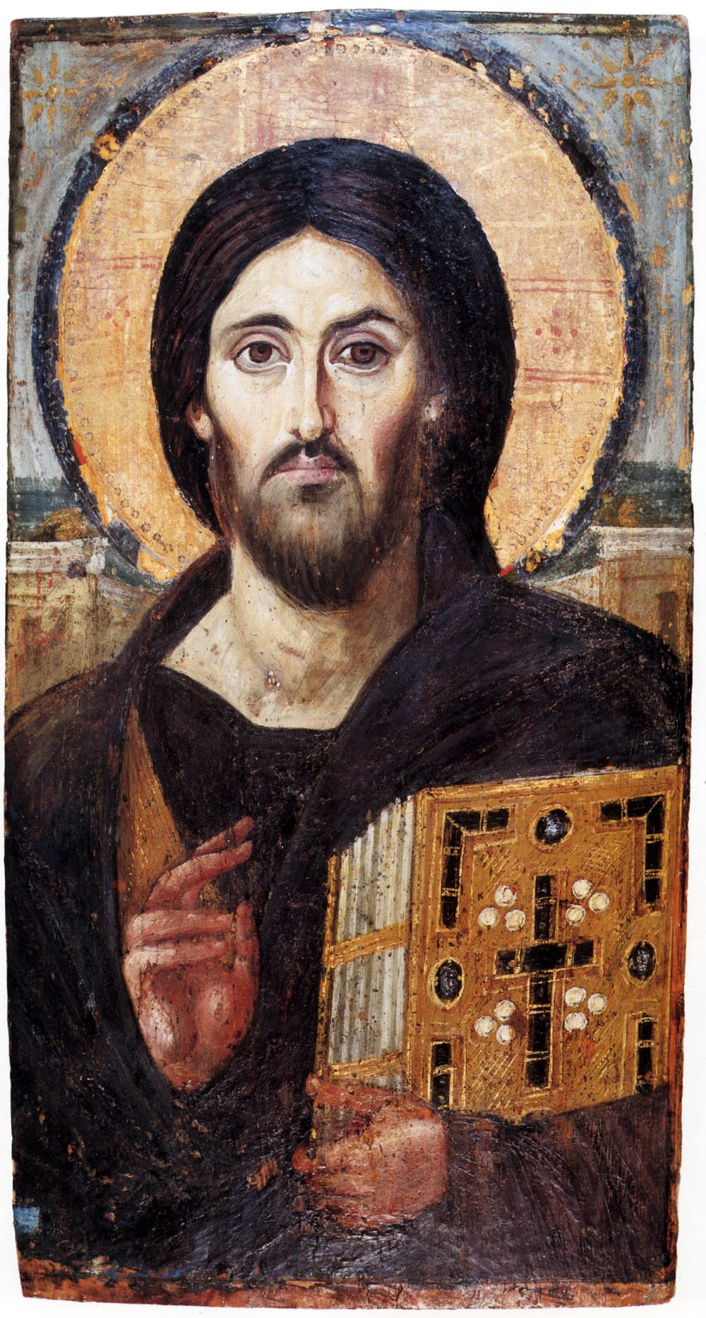 Cristo Pantocrátor, icono encáustico del Monasterio de Santa Catalina del Sinaí, siglo VI. Aquí ya está fijado el tipo que llega hasta hoy: hombre maduro, pelo largo con raya al medio, barba partida. Es una convención iconográfica estable, asociada a la majestad divina (con ecos de Zeus y Serapis), no un dato sobre su cara.